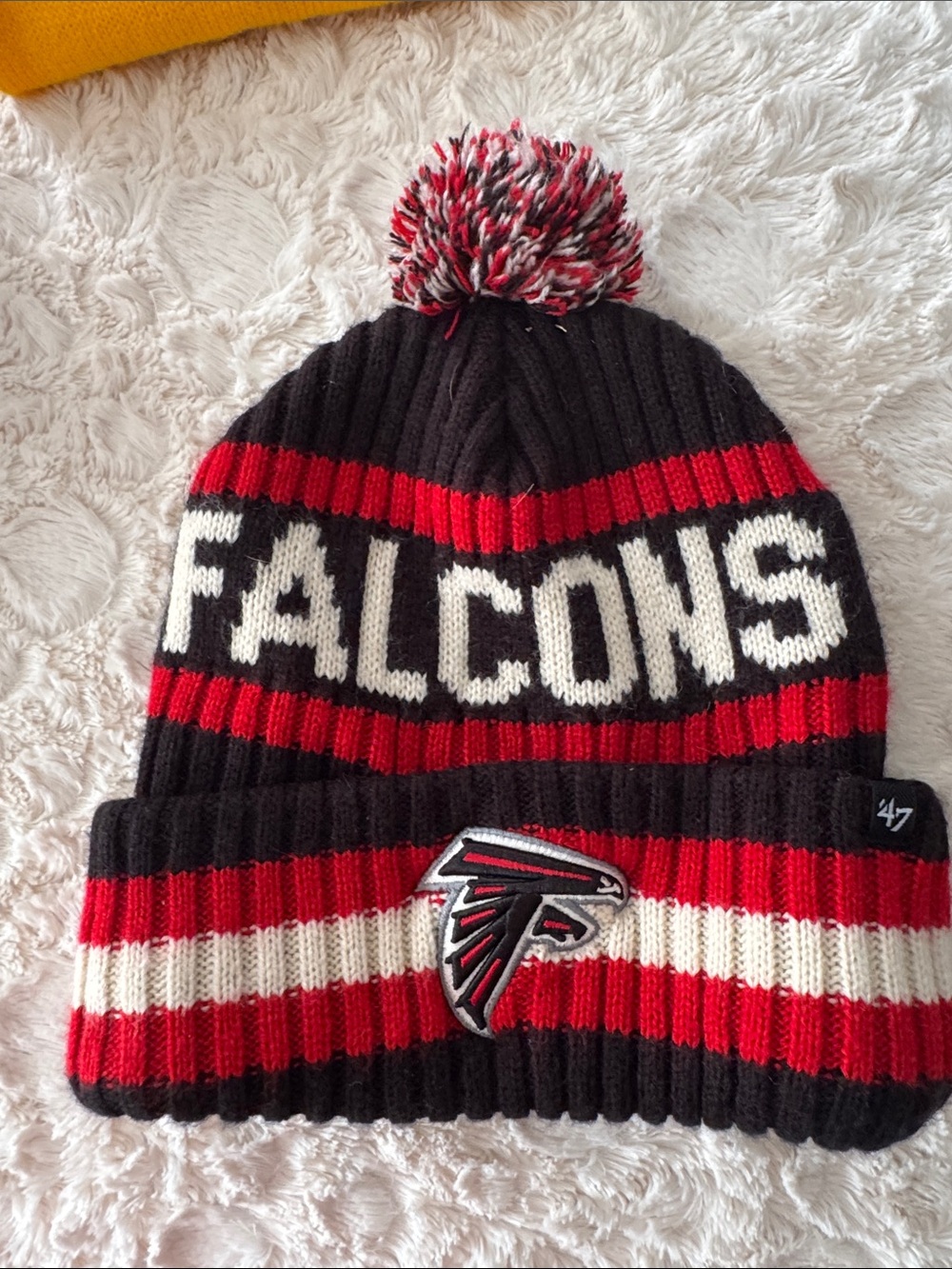 Falcons adults Pom Beanie Hat in Black, Red & White